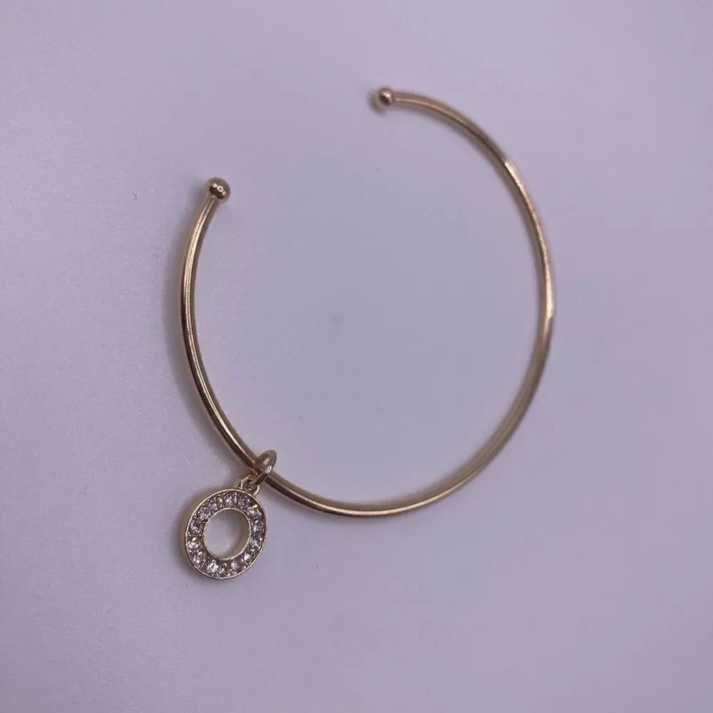 4/$20 Goldย tone bangleโcuff with floating crystalโcharm